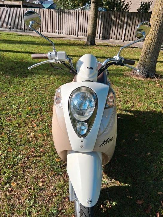 Sym mio blauw kenteken, Fietsen en Brommers, Scooters | SYM, Zo goed als nieuw, Mio, Benzine, Ophalen
