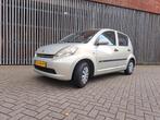 Daihatsu Sirion 1.0 51KW 2007 Beige, Auto's, Daihatsu, Voorwielaandrijving, Beige, Handgeschakeld, 3 cilinders