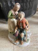 Beeld van Opa en Oma aan het knippen, Ophalen