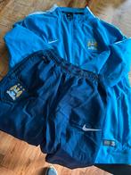 Manchester City trainingspak maat 170, Ophalen of Verzenden, Zo goed als nieuw, Jongen, Sport- of Zwemkleding