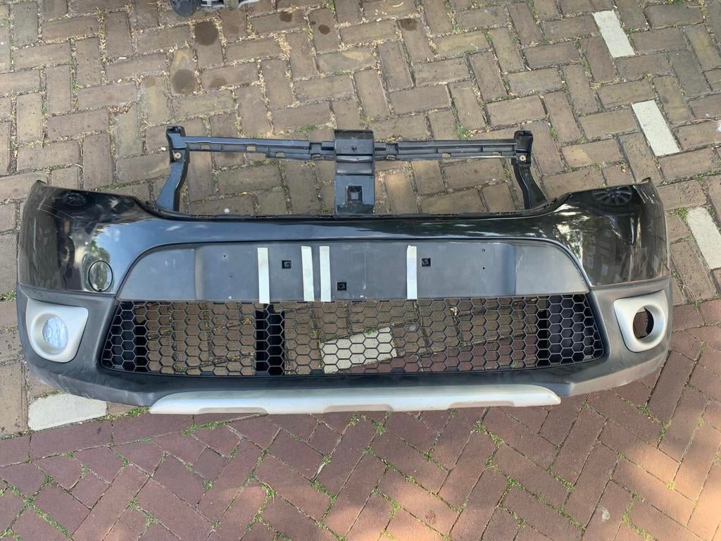 Nette voorbumper Dacia Sandero ll stepway/ logan compleet, Auto-onderdelen, Carrosserie en Plaatwerk, Ophalen of Verzenden, Dacia