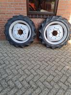 2 tractorbanden met velg, Ophalen