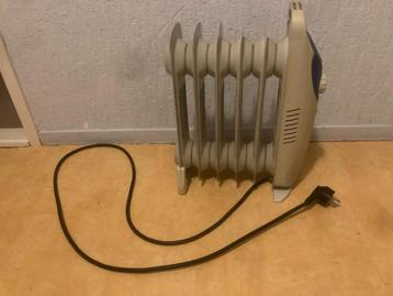 Elro VO3 olie gevulde mini radiator elektro mini kacheltje beschikbaar voor biedingen
