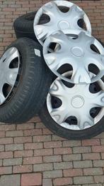Wieldoppen 14 inch Opel, Ophalen, Gebruikt