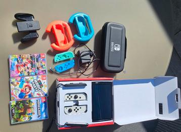 Complete Nintendo switch oled + toebehoren  beschikbaar voor biedingen