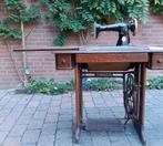 Antieke Singer trapnaaimachine, Ophalen