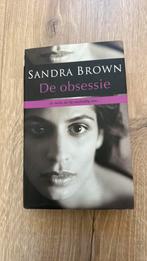 Sandra Brown - de Obsessie, Ophalen of Verzenden, Zo goed als nieuw