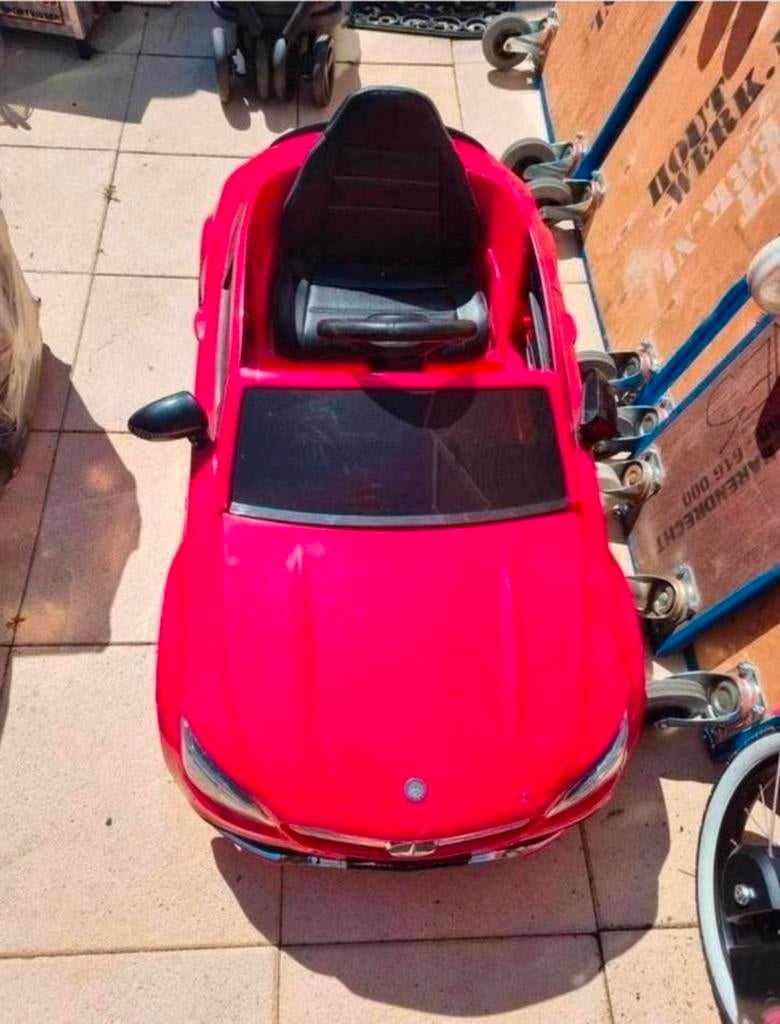 Deze roze elektrische Mercedes kinderauto, Ophalen