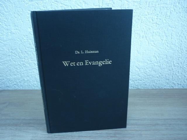 Ds. L. Huisman - Wet en evangelie, Boeken, Ophalen of Verzenden, Gelezen, Christendom | Protestants