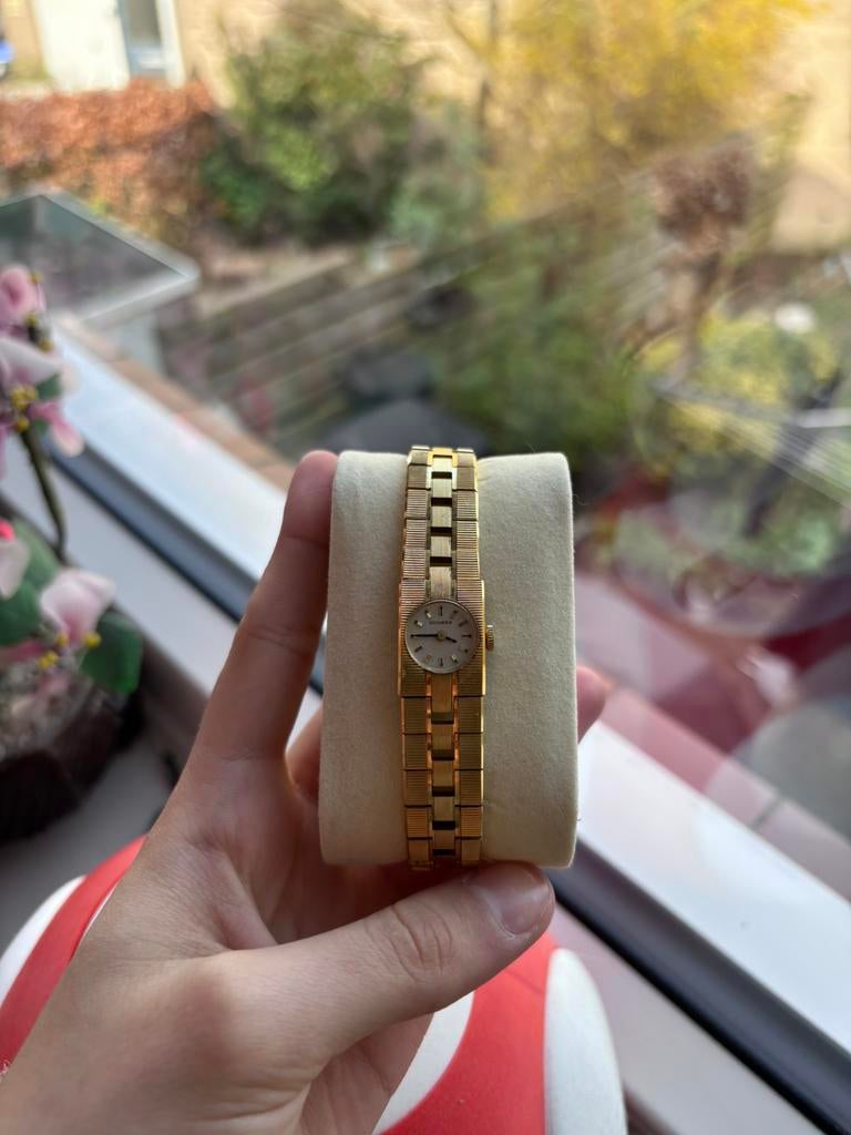 Vintage handopwinder dameshorloge van Dugena, Gebruikt, Ophalen of Verzenden, 17 tot 18, Dame