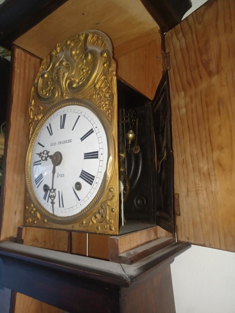 Mooie staande comptoiseklok, Ophalen