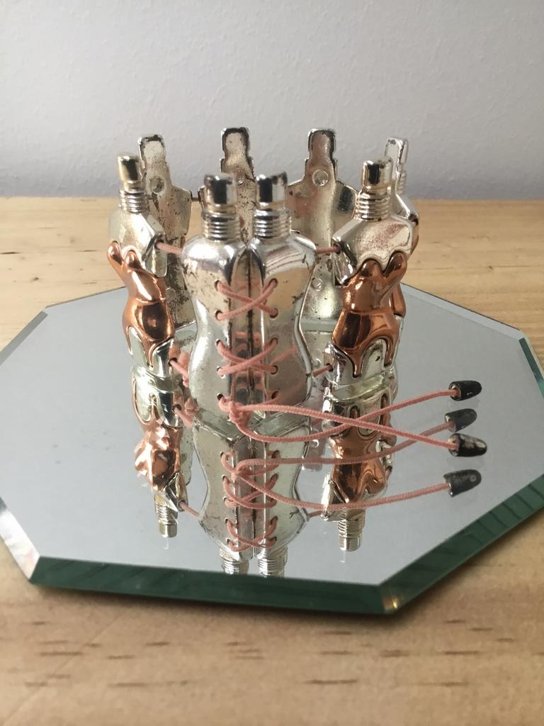 Vintage Jean Paul Gaultier armband parfumfles korsetten, Ophalen of Verzenden, Gebruikt, Zilver, Overige materialen