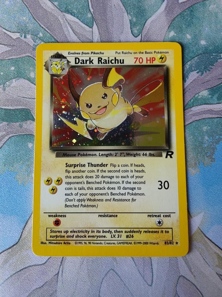 Pokemon team rocket dark Raichu Holo near mint 83/82, Hobby en Vrije tijd, Verzamelkaartspellen | Pokémon, Zo goed als nieuw, Losse kaart