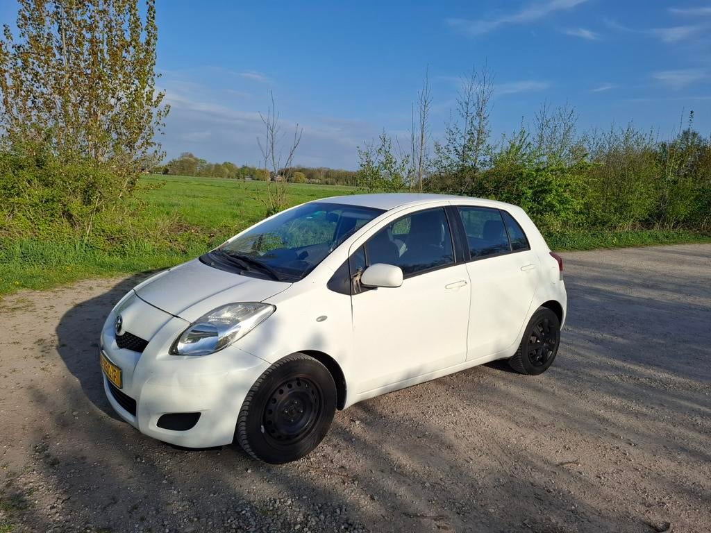 Witte Toyota Yaris - 2009 - VTI 16V 1.3, Auto's, Toyota, Stof, Wit, Handgeschakeld, Grijs