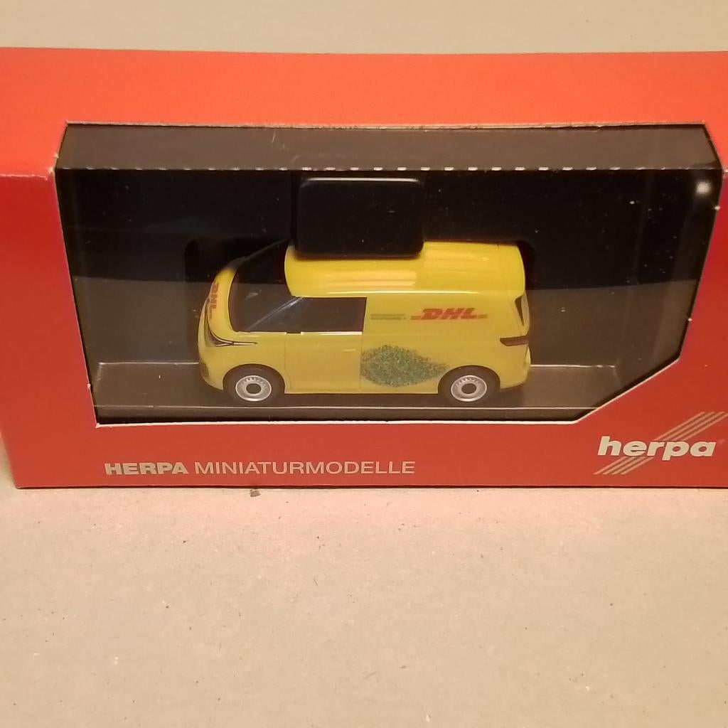 Aangeboden Herpa ID BUZZ in DHL uitvoering,  nieuw in doos, Hobby en Vrije tijd, Modelauto's | 1:87, Ophalen of Verzenden, Nieuw