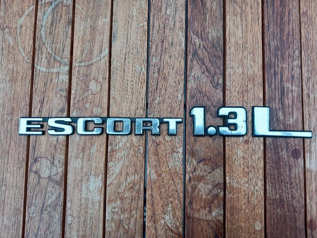 Ford embleem Escort 13L 1981 origineel, Ophalen of Verzenden