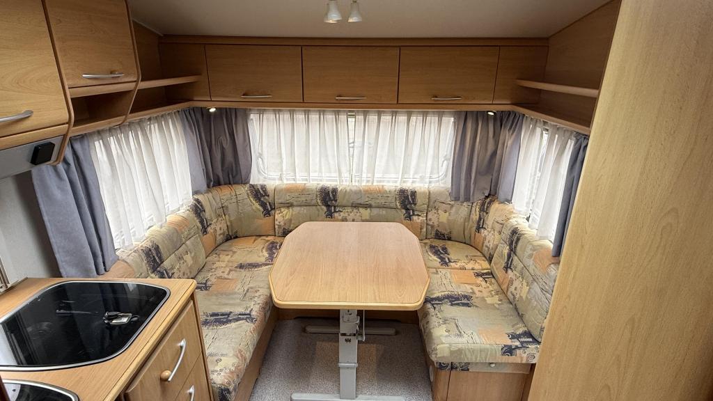 Knaus Sudwind 450 TF bouwjaar 2001 met voortent, Caravans en Kamperen, Caravans, Rondzit, Bedrijf, Schokbreker, Overige typen
