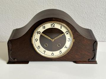 Pendule, donker hout beschikbaar voor biedingen