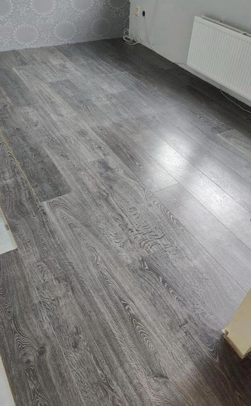 Balterio kliklaminaat 4VGroef 45m2 donkerbruin is uitgehaald, Huis en Inrichting, Stoffering | Vloerbedekking, Gebruikt, Laminaat