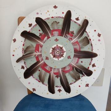 Mandala van veren beschikbaar voor biedingen