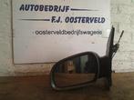 Buitenspiegel links van een Volkswagen Fox