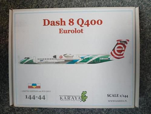 Karaya Dash 8-Q400 Eurolot 1/144, Hobby en Vrije tijd, Modelbouw | Vliegtuigen en Helikopters, Zo goed als nieuw, Vliegtuig, 1:144 tot 1:200
