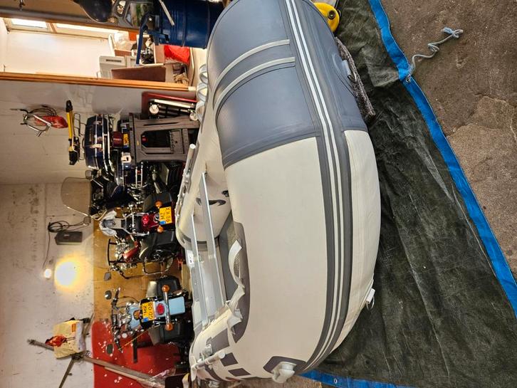 Rubberboot airdek 330, Watersport en Boten, Rubberboten, Zo goed als nieuw, Overige merken, Minder dan 70 pk, Benzine, Ophalen