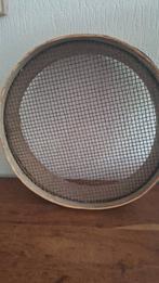 Een oude zeef brocante, Ophalen