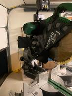 Hitachi afkortzaag met zaagonderstel,extra zaagblad, Doe-het-zelf en Verbouw, 70 mm of meer, Ophalen of Verzenden, Zo goed als nieuw
