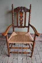 Prachtige antieke eiken stoel, fauteuil met biezen zitting
