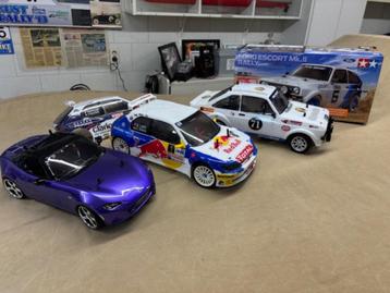 Per stuk te koop: 3x Tamiya 1:10 Ford Escort Peugeot Mazda  beschikbaar voor biedingen