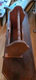 Houten krantenbak, Ophalen