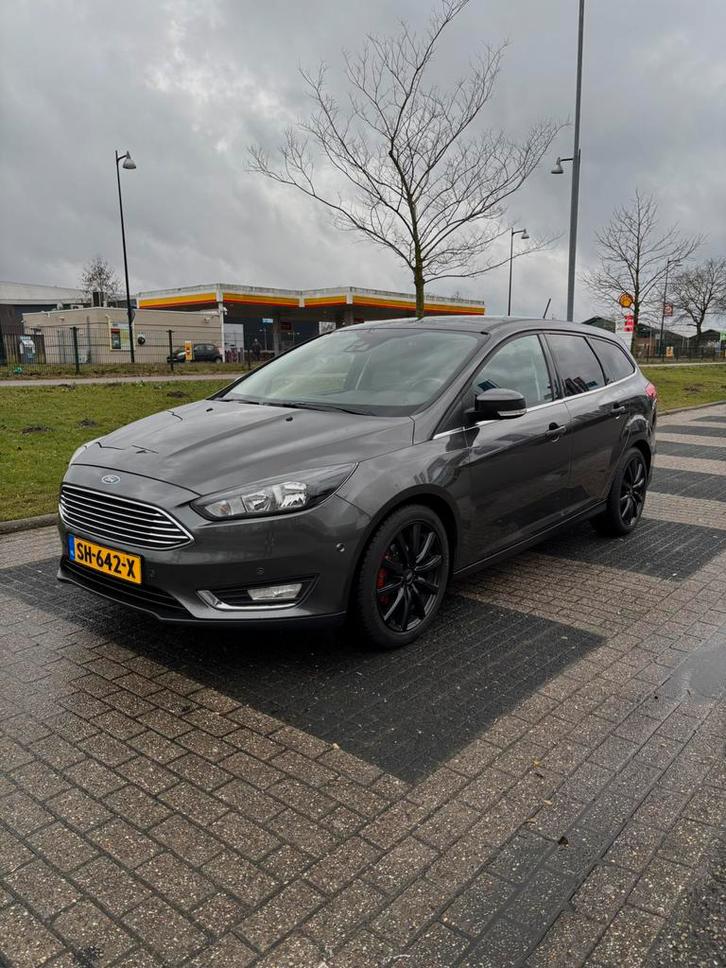 Ford Focus 1.0 Titanium Winterpack Full Option + Zomerbanden, Auto's, Ford, Particulier, Focus, Achteruitrijcamera, Airbags, Airconditioning