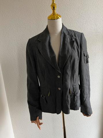 Sportief grijs jasje met limegroene voering van bandolera beschikbaar voor biedingen