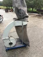 Stof afzuiging installatie, Ophalen
