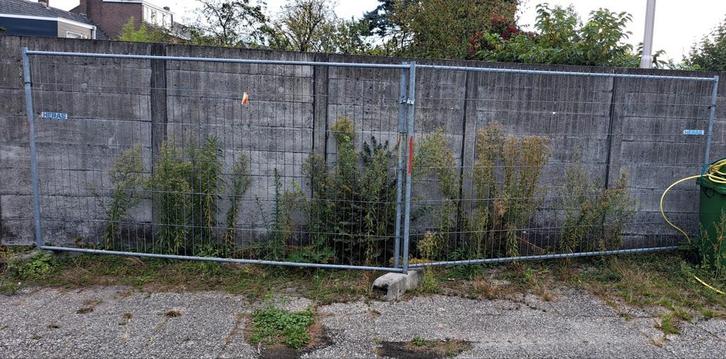 2 Heras Bouwhekken te koop met 2 Stenen Blokken, Doe-het-zelf en Verbouw, Steigers, Ophalen
