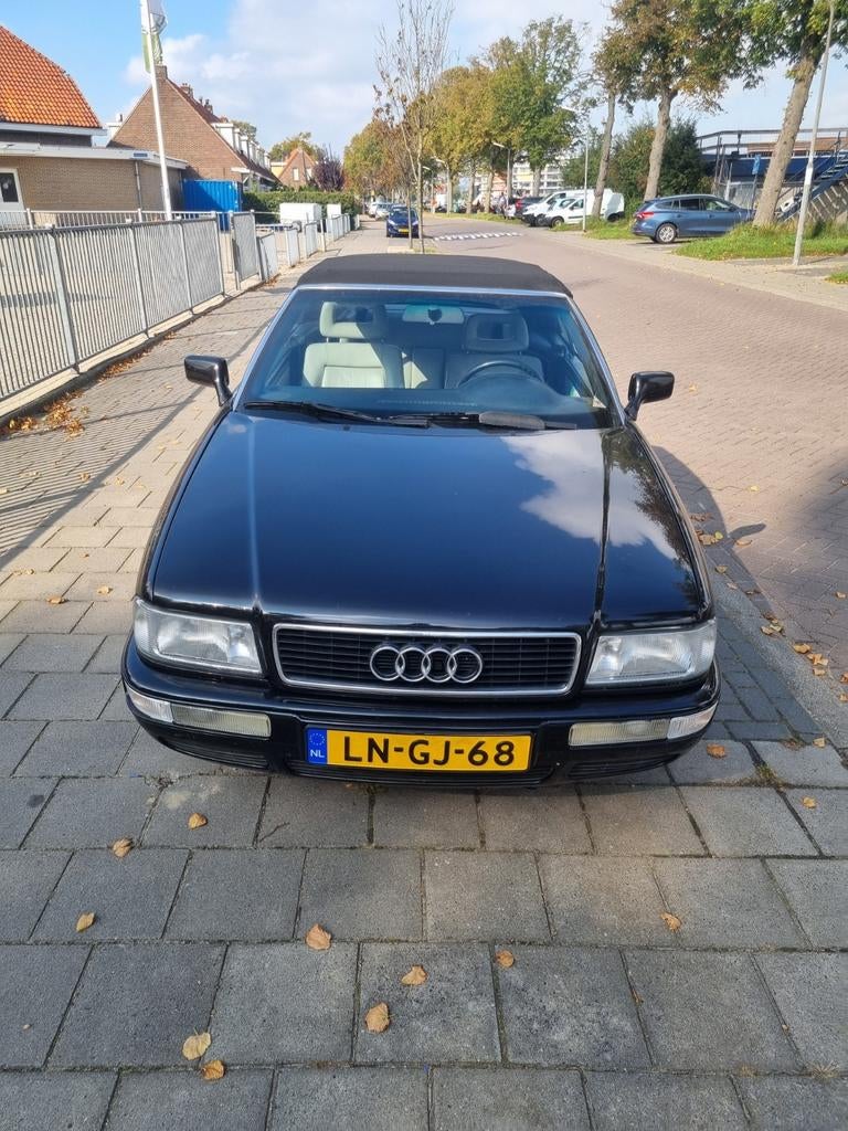 Audi Cabrio 2.3 E 98KW U9 1992 Zwart, Auto's, Audi, Voorwielaandrijving, 136 pk, 1350 kg, Cabriolet