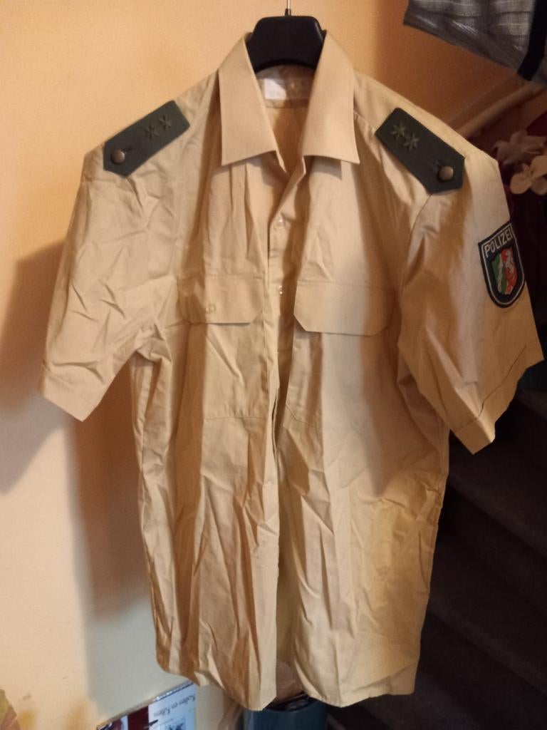 Duitse politie overhemd, Ophalen