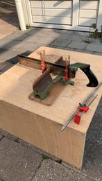 Antieke verstekzaag, Ophalen