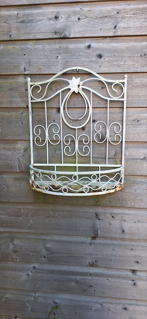 Wanddecoratie tuin, Ophalen