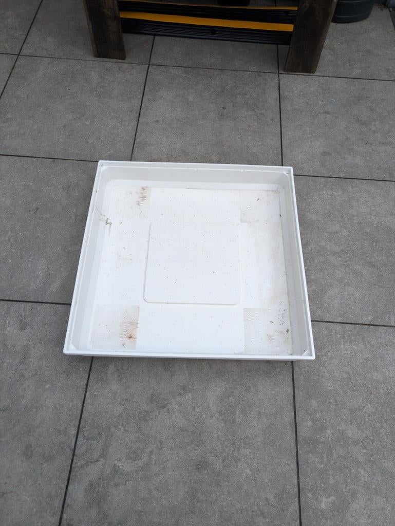 Lekbak wasmachine, Ophalen