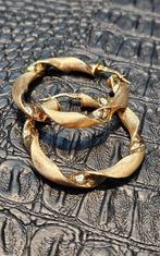 Prachtige 14karaat gouden wokkel oorbellen