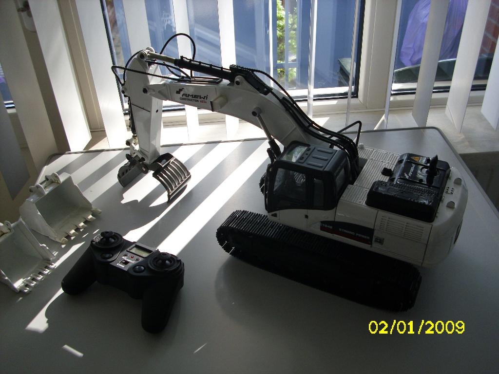 Amewi rc graafmachine geheel metaal, 220 euro., Hobby en Vrije tijd, Gebruikt, Schaal 1:14, Ophalen of Verzenden, Onderdeel