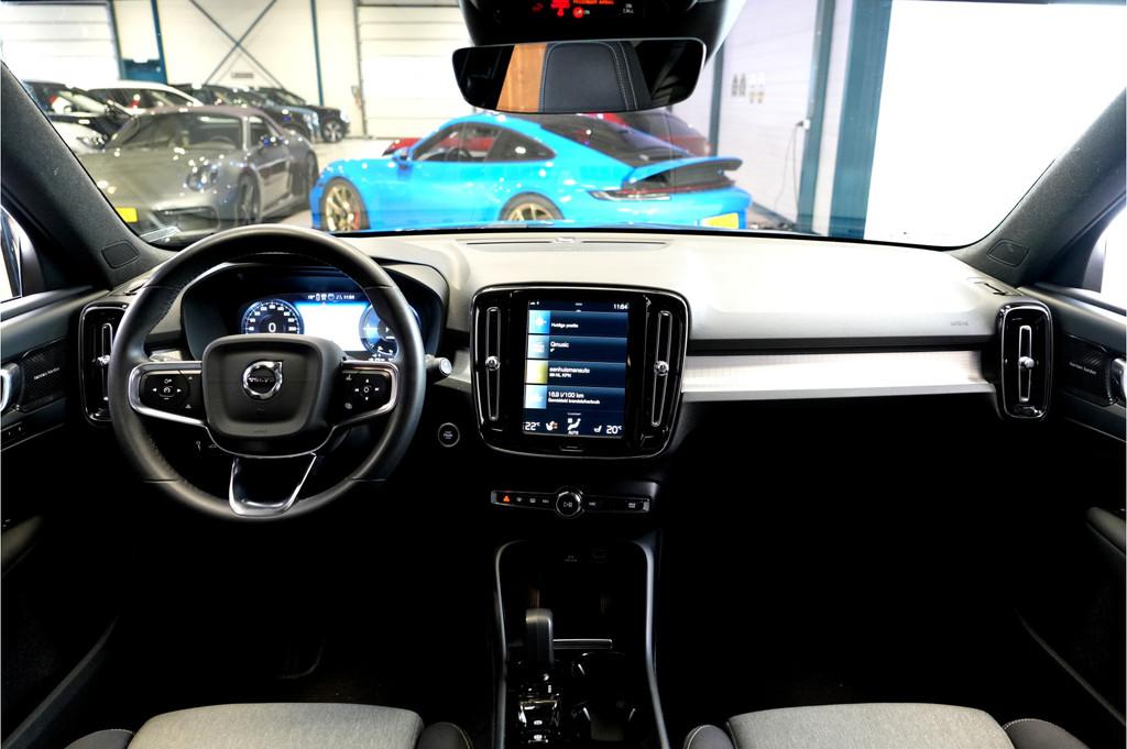 Volvo XC40 1.5 T4 Plug-in Hybrid 155kW/211pk DCT7 Plus Dark, Stof, Met garantie (alle), Blauw, Plug-in hybride