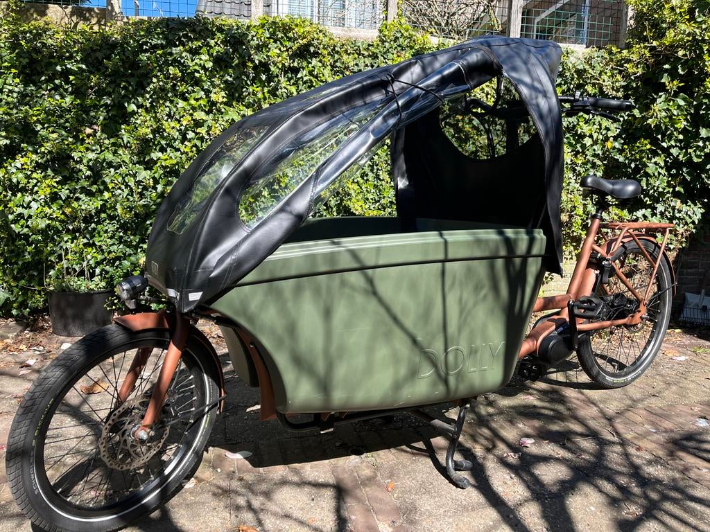 Dolly Bakfiets koper met groene bak, regenhuif en zitkussen, Gebruikt, Elektrisch, 2 kinderen, Ophalen