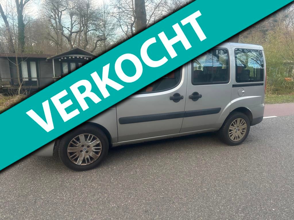 Fiat Doblò 1.4 Family 7 PERSOONS AIRCO 2 SCHUIFDEUREN, Auto's, Fiat, Voorwielaandrijving, Gebruikt, 4 cilinders, 7 stoelen
