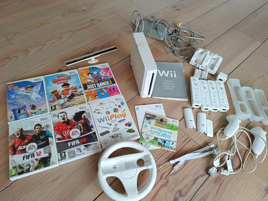 Complete Wii set met 7 spellen, stuur en nunchucks, Spelcomputers en Games, Spelcomputers | Nintendo Wii, Ophalen of Verzenden