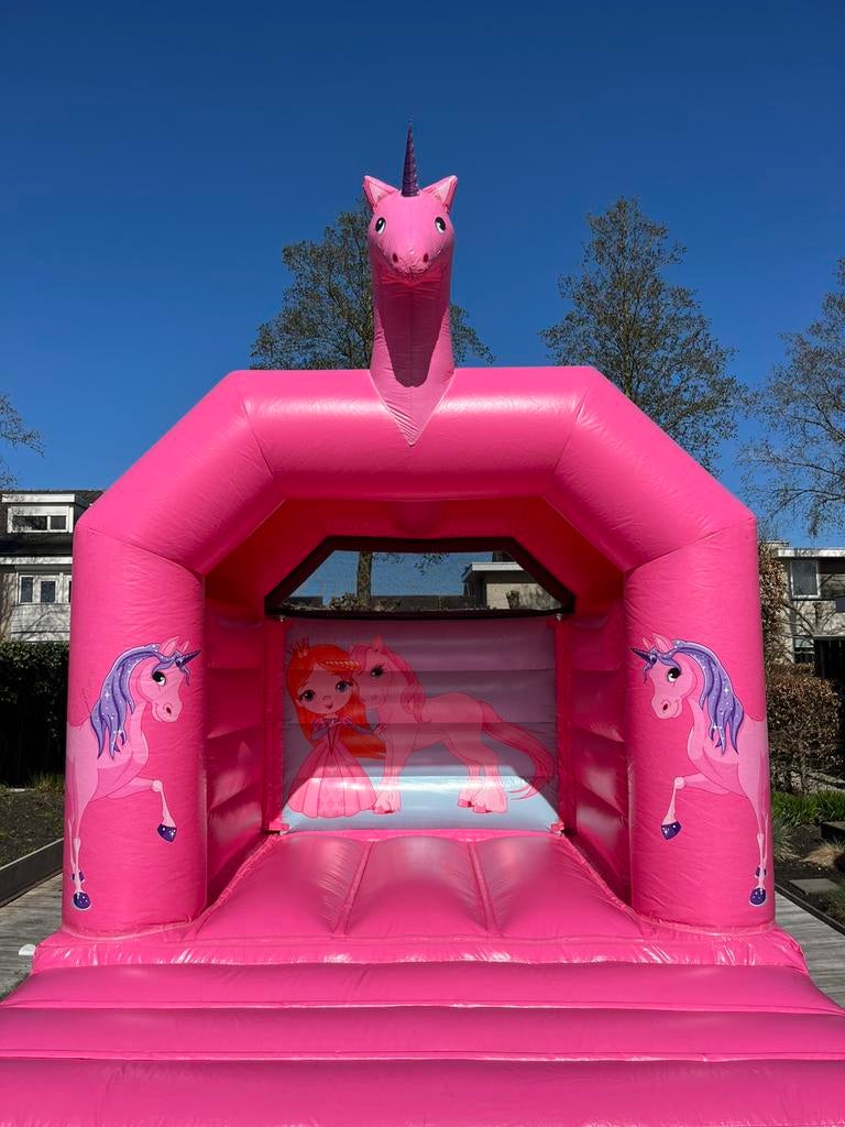 Te huur: Roze Unicorn springkussen. Koningsdag beschikbaar, Ophalen, Zo goed als nieuw, Verjaardag
