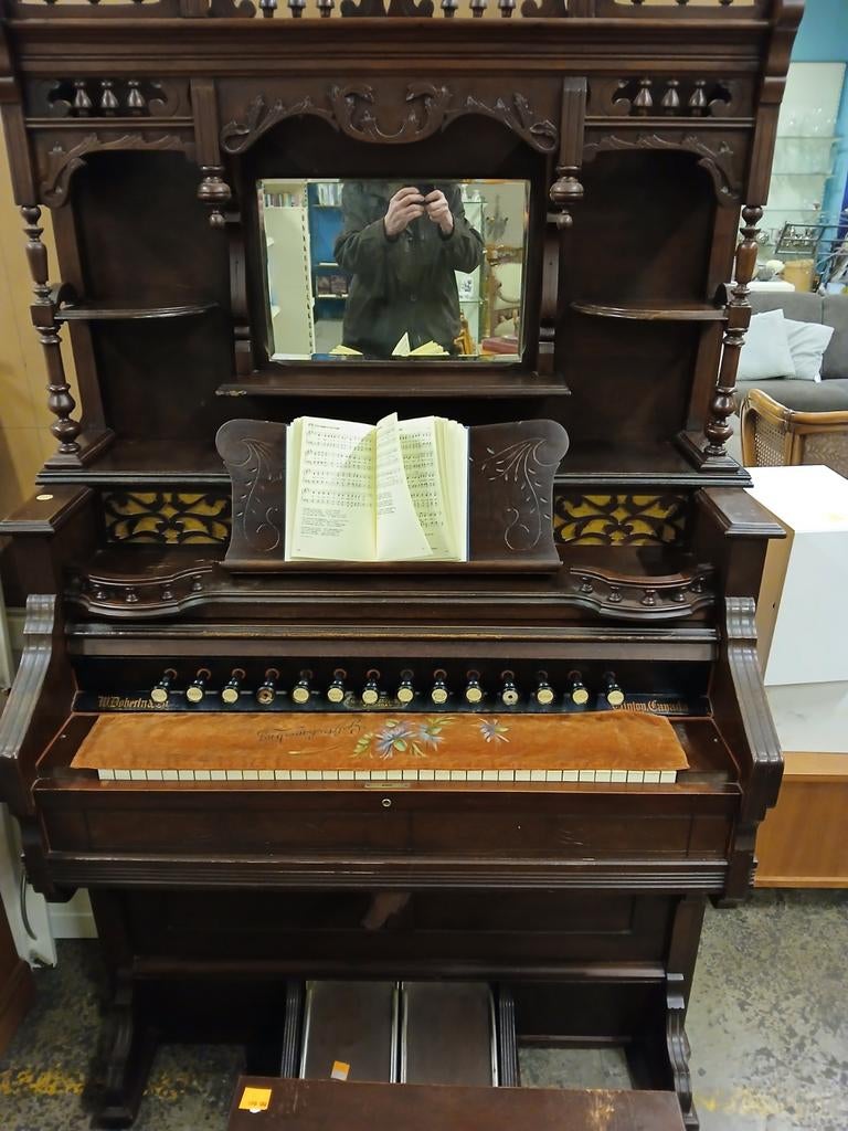 Traporgel harmonium met fraai houtsnijwerk, Ophalen