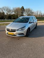Opel Astra 1.0 Turbo 105pk Start/stop 2019 Grijs, Auto's, Voorwielaandrijving, 620 kg, Origineel Nederlands, Stationwagon